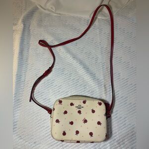 COACH Ladybug Shoulder bag with red strap. Barely used.